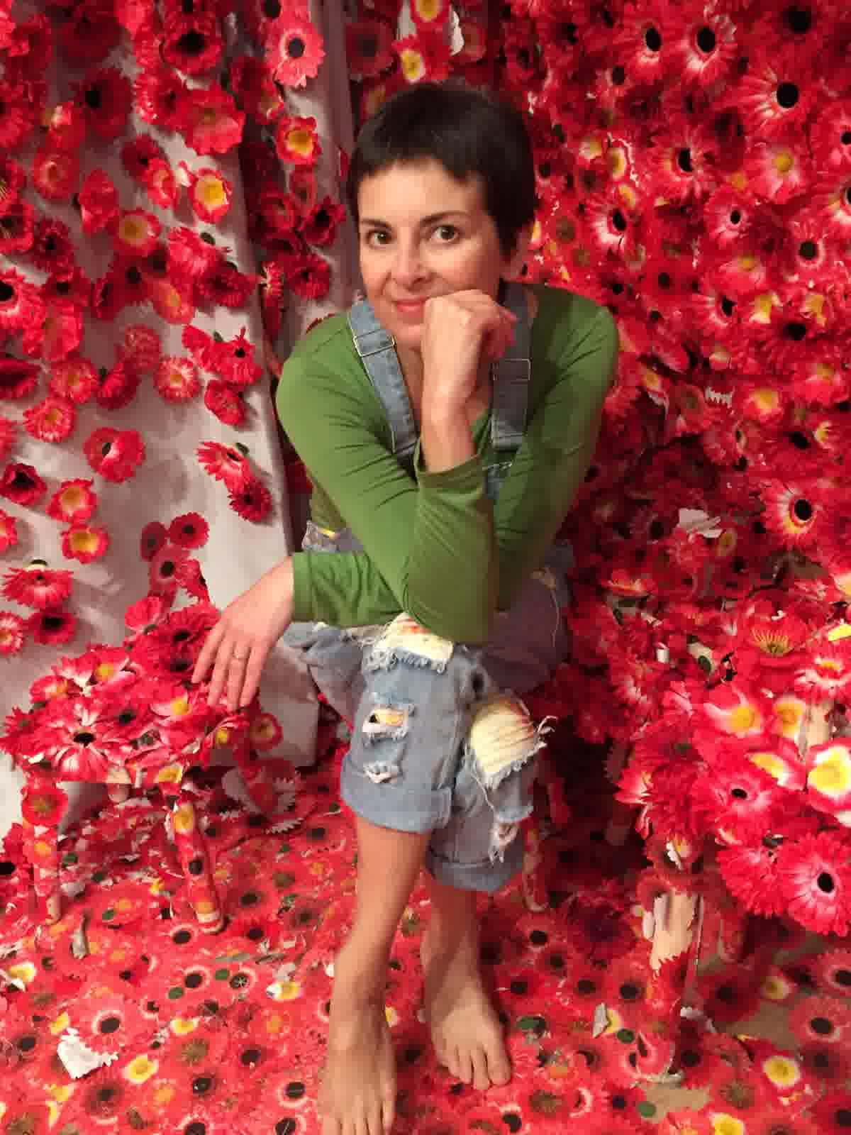 Aurora in a quirky character look among poppies